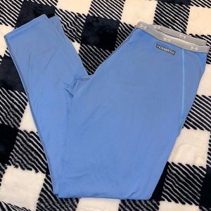 Woman’s Under Armour Base Layer Pants Size Small in the color Blue